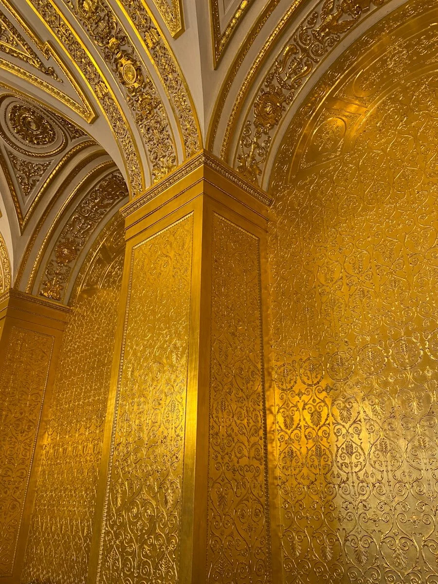 Gold-finished architectural vault